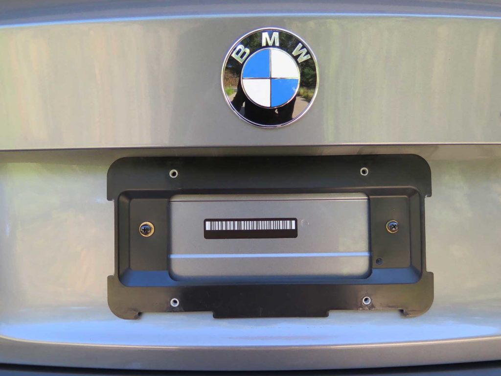 2011 BMW 335i Coupe rear license plate bracket mounted on trunk lid.