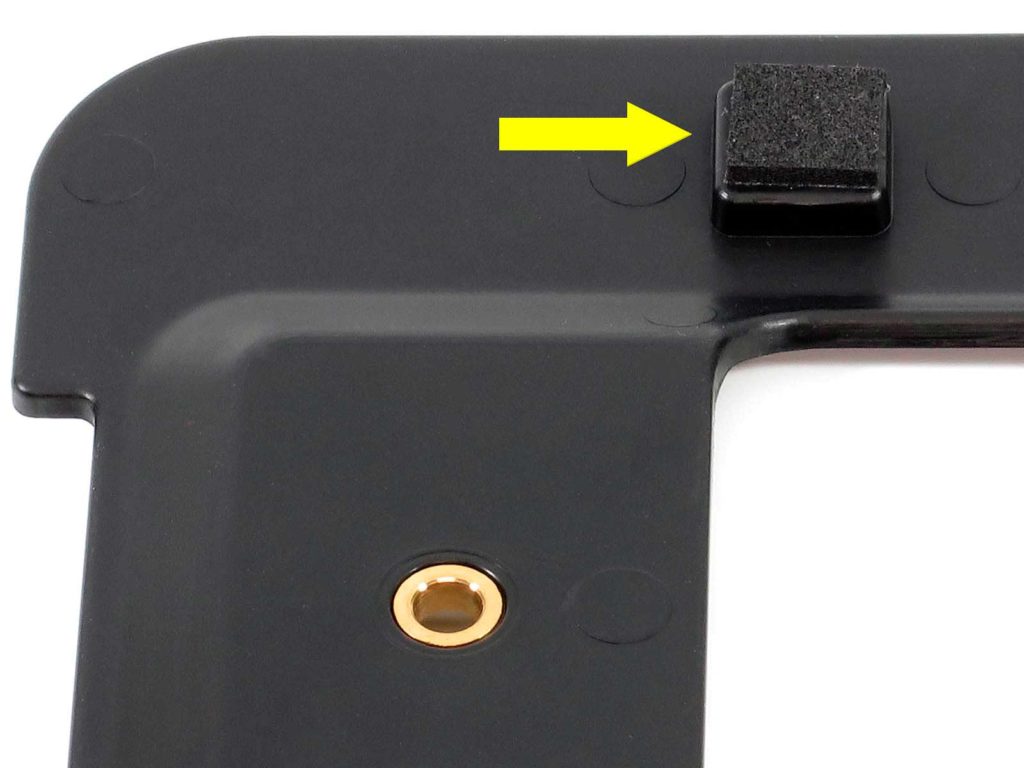 Yellow arrow indicates built-in foam pads behind threaded inserts.